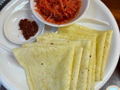 酸萝卜炒牛肉配饼-玛禄藏膳(五分店)