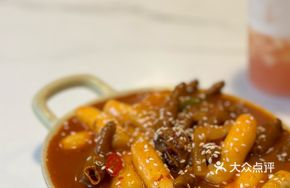 Stir-Fried Chicken Feet with Rice Cake