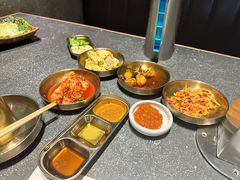 -草家酱蟹炭火烤肉店(珲春南路二店)
