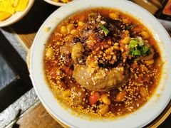 -老牌坊云南鱼豆花火锅(哈西万达店)