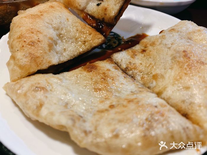 冯四孃跷脚牛肉·非物质文化遗产店红糖饼图片