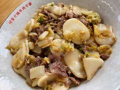 鲜牛肉炒年糕-经堂北路牛肉干面·溪口蒋永峰牛肉馆(宁波店)