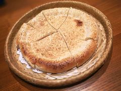 馕坑芝麻馕-巴扎美食·新疆菜·西域歌舞表演餐厅(新疆大厦店)