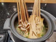 -明何记涮牛肚(品牌首店隋唐植物园南门古城路店)