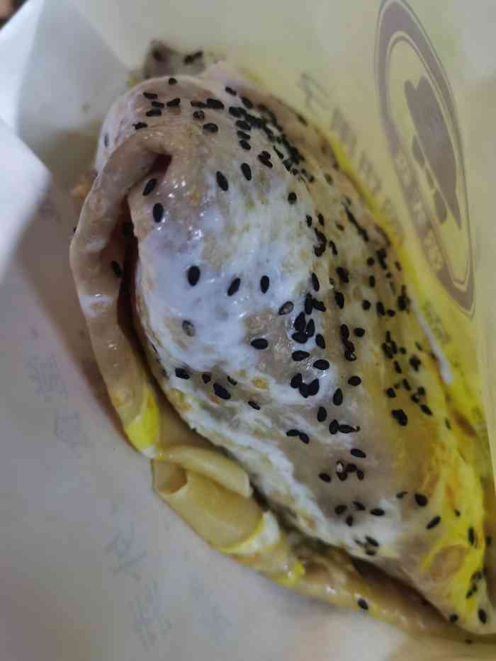 粥先森煎饼果子-"新客家1块钱的煎饼果子加上包装费也不过3.