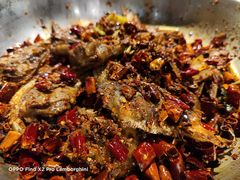 爆辣干锅鸭头-安诚居干锅鸭头(八角店)