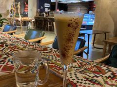 酒弦子拿铁-雪域咖啡SNOWCOVEREDPLATEAUCAFE