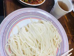 -歹歹的加个面过油肉拌面