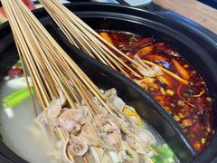 -明何记涮牛肚(品牌首店隋唐植物园南门古城路店)