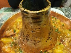 土司铜锅油焖鸡-浩海火烧云傣家菜(京广店)