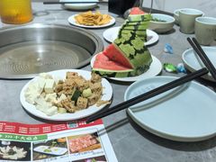 -明何记涮牛肚(品牌首店隋唐植物园南门古城路店)