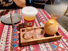 云南纂新奶白酒-火塘云南烧烤大排档