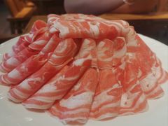 -明何记涮牛肚(品牌首店隋唐植物园南门古城路店)