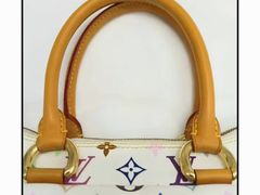 -爱革·奢品·鞋包·衣物·家居(金桥国际商业广场店)