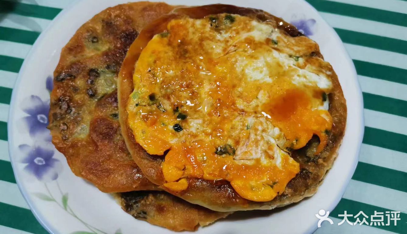 富强街的葱油饼啦啦也有啦