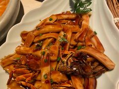 梭子蟹炒年糕-卯时·龙光雅宴·精致锡帮菜(惠山古镇店)