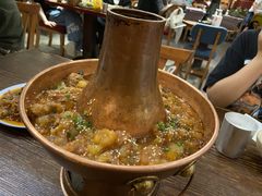 土司铜锅油焖鸡-浩海火烧云傣家菜(京广店)