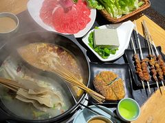 -明何记涮牛肚(品牌首店隋唐植物园南门古城路店)