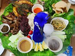 -沐毫傣泐云南菜孔雀宴•手抓饭傣味烧烤(曼听公园店)