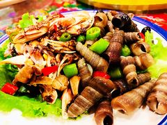 麻辣钉螺-闯关东东北农家菜(崂山石老人店)