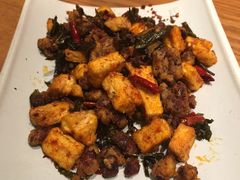 普洱茶炒包浆豆腐-云海肴·汽锅鸡·云南菜(天山百盛优客店)