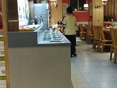-明何记涮牛肚(品牌首店隋唐植物园南门古城路店)