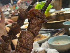 -明何记涮牛肚(品牌首店隋唐植物园南门古城路店)