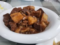 土豆烧牛腩-华春餐馆(鱼山路店)