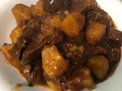 土豆炖牛腩-华春餐馆(鱼山路店)