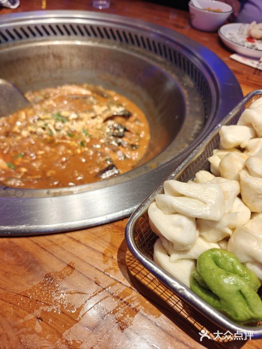 山河屯铁锅炖(哈西站店)图片