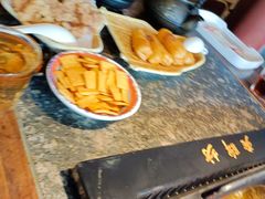 -老牌坊云南鱼豆花火锅(哈西万达店)