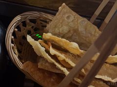 -老牌坊云南鱼豆花火锅(哈西万达店)