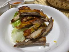 馕坑果木烤羊排-巴扎美食·新疆菜·西域歌舞表演餐厅(新疆大厦店)