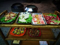 -彝人部落火盆烧烤(原内环足球场店)