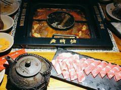 -老牌坊云南鱼豆花火锅(哈西万达店)