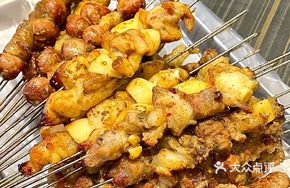 Grilled Lamb Skewers, Fried Chicken Strips, Garlic Pork