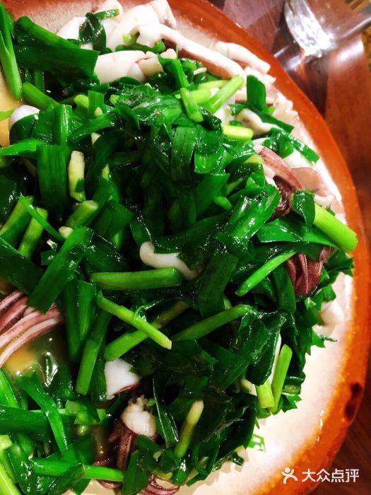 鑫富安村庄稼院韭菜炒墨斗图片