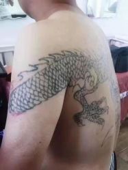 -九纹龙纹身馆