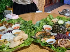 -沐毫傣泐云南菜孔雀宴•手抓饭傣味烧烤(曼听公园店)