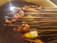 -拈签一笑黄牛肉辣卤串串