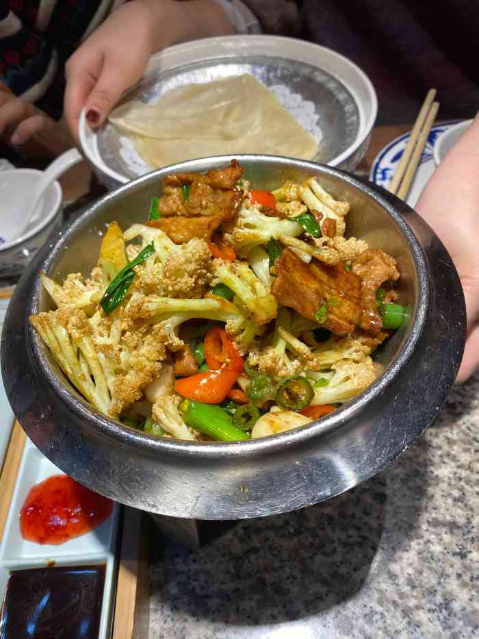 十里春饼-"很不错的一家店,装修也比较有特色,最关键.