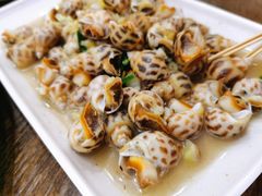 葱姜炒花螺-贞姨美食·老字号海鲜大排档