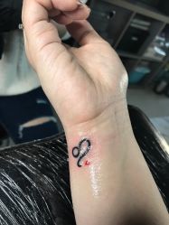 -SNOW TATTOO STUDIO