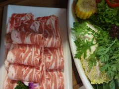 -老牌坊云南鱼豆花火锅(哈西万达店)
