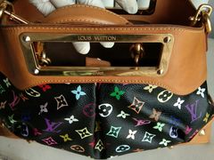 -京伟修鞋洗鞋奢侈品皮具护理店