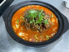 -明何记涮牛肚(品牌首店隋唐植物园南门古城路店)