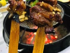 -彝人部落火盆烧烤(原内环足球场店)