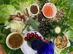 -沐毫傣泐云南菜孔雀宴•手抓饭傣味烧烤(曼听公园店)