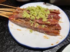 湿辣牛肉-何妹湿辣牛肉·粤式烧烤砂煲(桂雅路店)