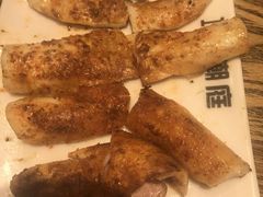 烤鱿鱼-潮庭·大连海鲜·炭火烧烤·扇贝王(大连店)